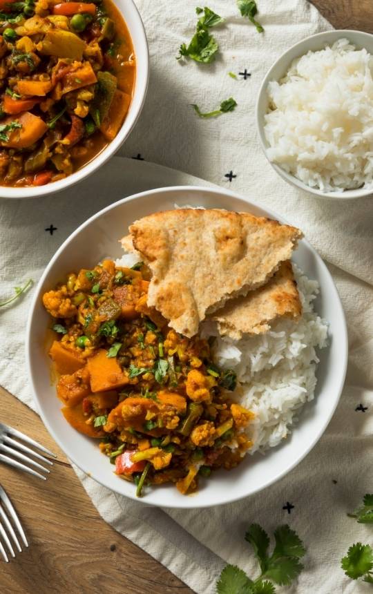 vegan thai red curry recipe with rice and flat bread