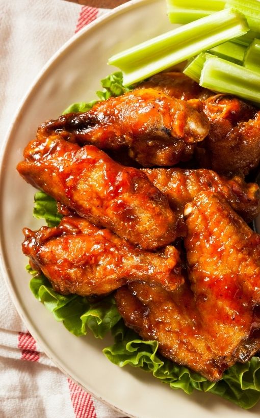 close up baked buffalo wings