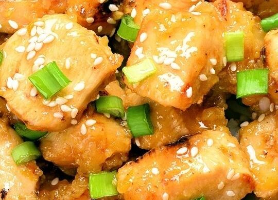 Close up shot of panda express orange chicken copycat recipe in a wodden bowl