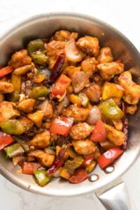 steps to make Szechuan Chicken recipe sauted bell pepper and tender chicken pieces