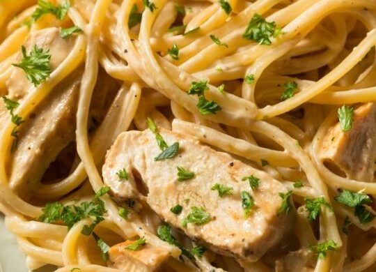 close up to creamy Chicken Alfredo dish