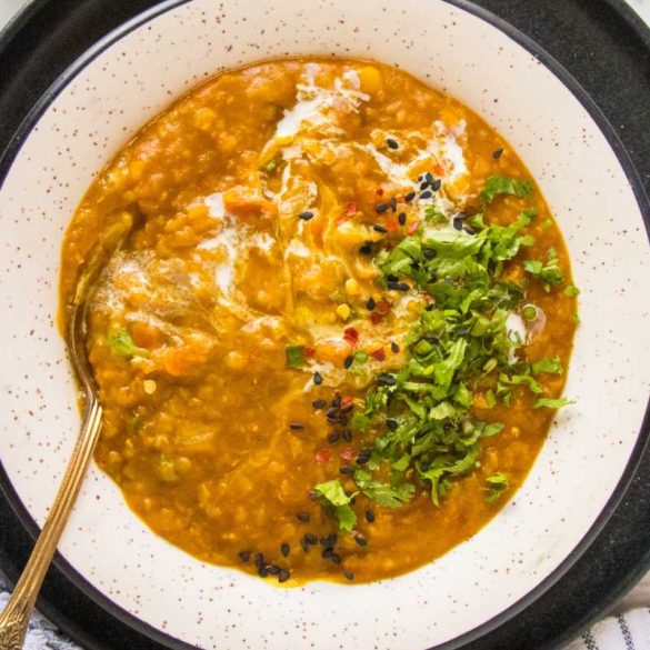 red lentil soup recipe served on a white bowl