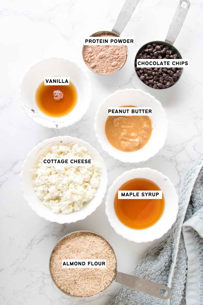 Ingredients measured in measuring cups to make Cottage Cheese Cookie Dough