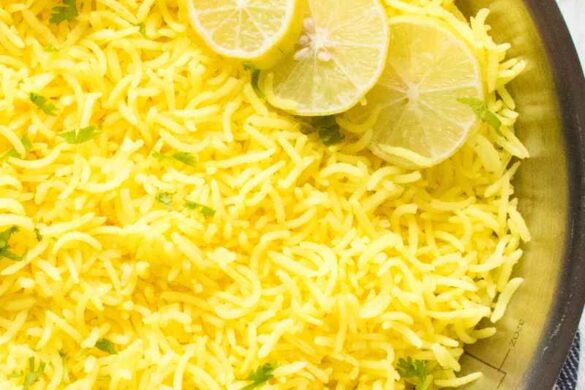 close up of lemon rice with lemon slices