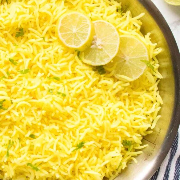 close up of lemon rice with lemon slices